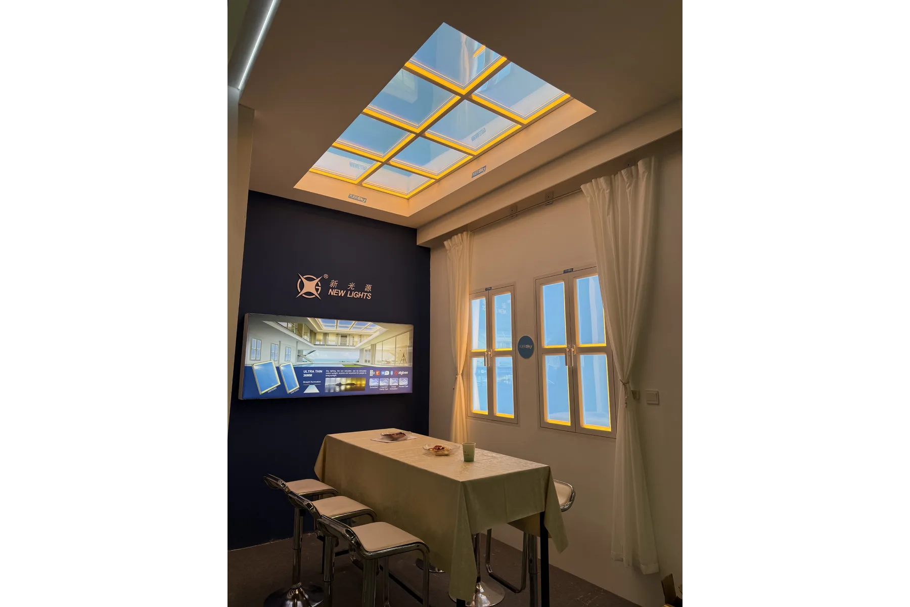 Ceiling lighting display at the New Lights booth during GILE 2026