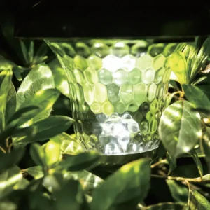 XGY-SH-BT-GL8022 black faceted solar landscape light among garden foliage