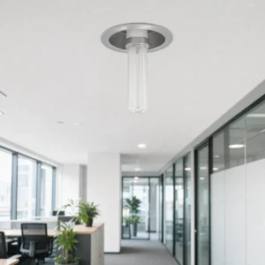 Short PL-S plug-in fluorescent lamp fully seated in a compatible office ceiling downlight