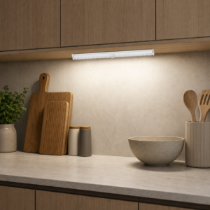 Battery PIR cabinet lamp installed below an indoor kitchen cabinet