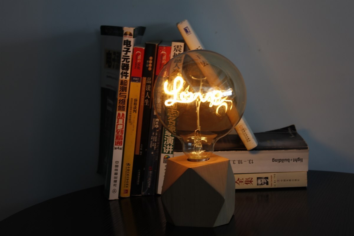 Decorative word filament bulb used as a visual concept reference