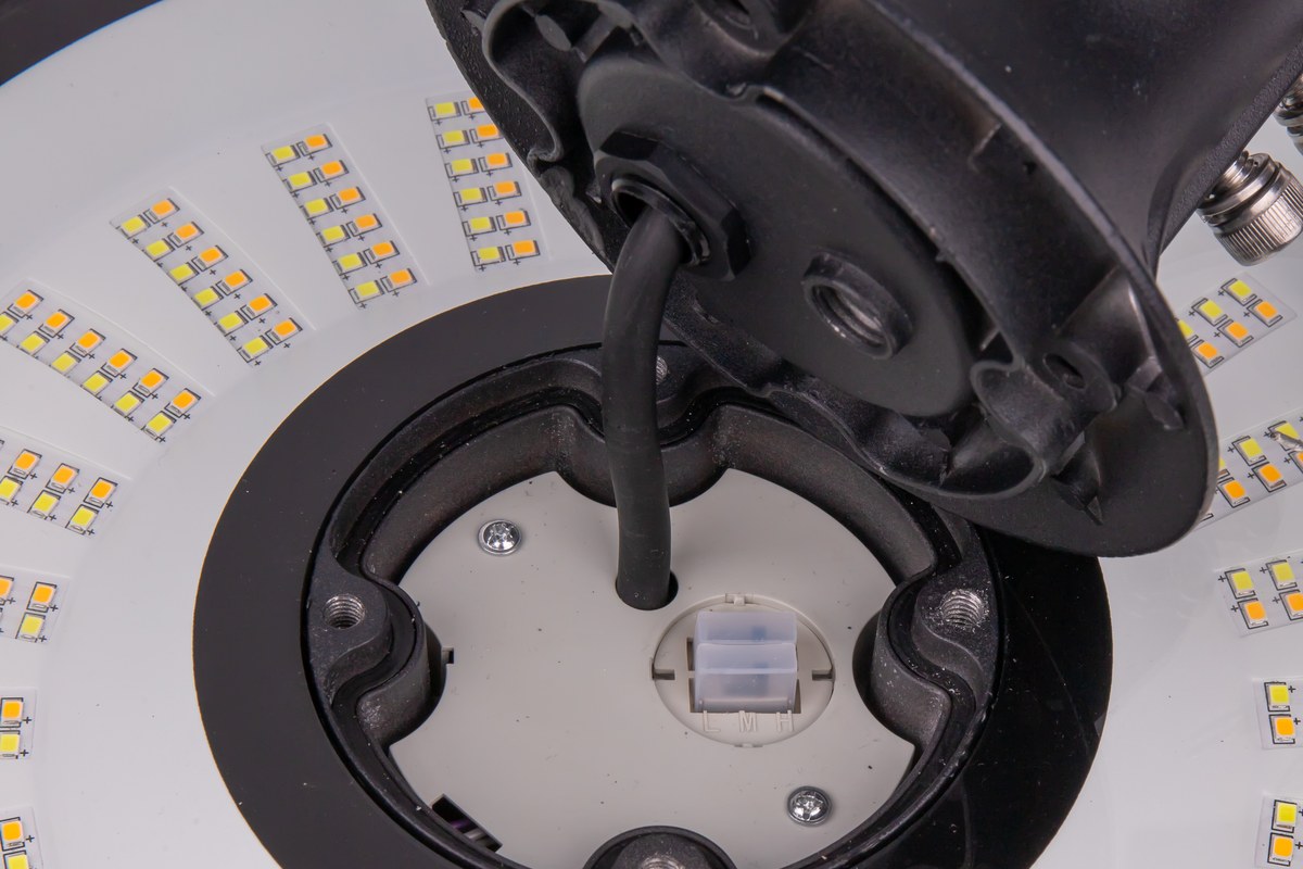 Interior of a New Lights garden luminaire showing LED boards, mounting structure and cable path