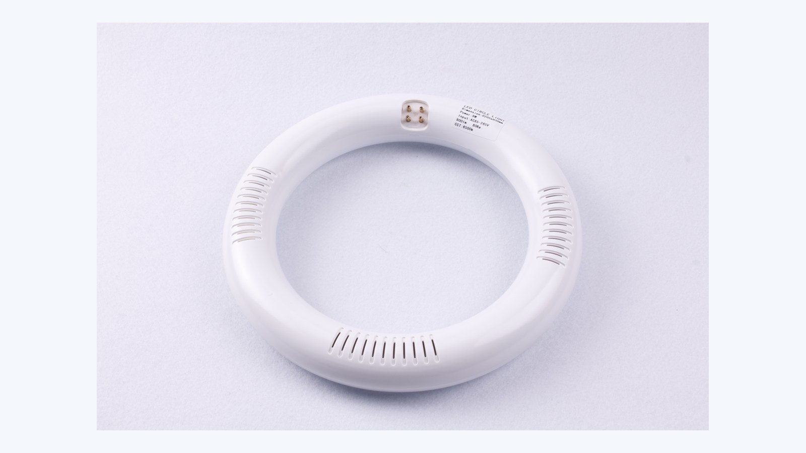 New Lights LED circular lamp showing its ring body and four-pin connection
