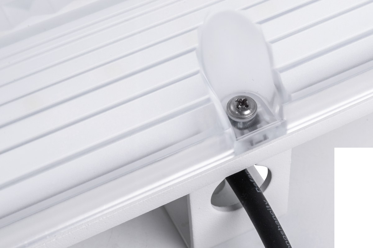 New Lights wall luminaire close-up showing cable entry, enclosure and mounting detail