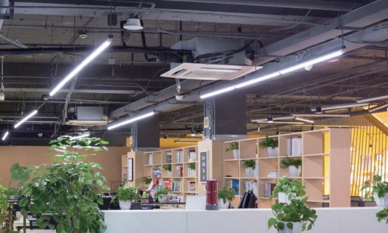 Linear LED fixtures illuminating an open office application